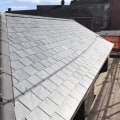 What are the main components of a roof and their functions?